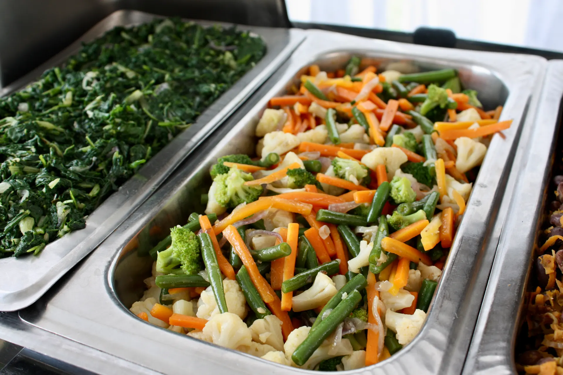 Simple, approachable buffet spread of vegetables and mash